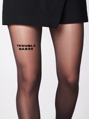 Strumpfhose mit dem Statement Troublemaker von saint sass.