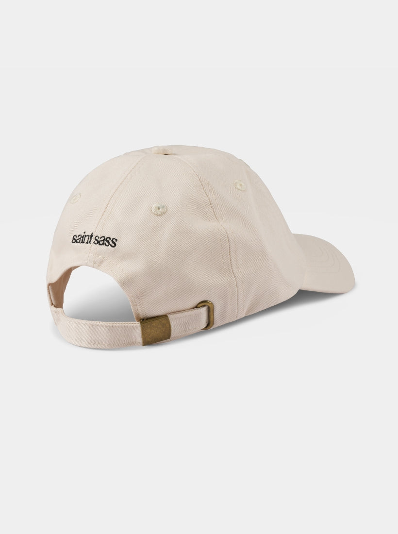 Beige Cap mit dem Statement Out Of Office (Forever) von saint sass und hinten mit gesticktem Logo.