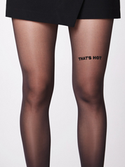 Schwarze Statement Strumpfhose mit dem Statement That's Hot auf dem linken vorderen Oberschenkel.