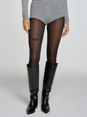 Troublemaker Statement Strumpfhose in schwarz von saint sass.