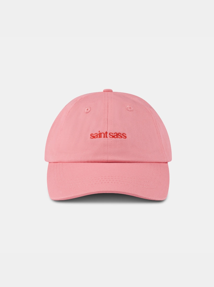 Cap von saint sass. Rosa Cap mit der Stickerei saint sass vorne.